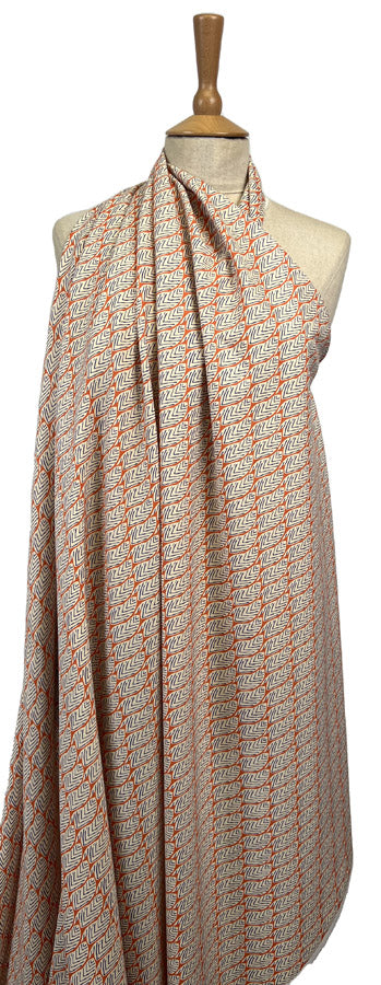 Pima Cotton Lawn Tribal Grove Orange Leaf Print Blue Woven Dress Fabric Mannequin