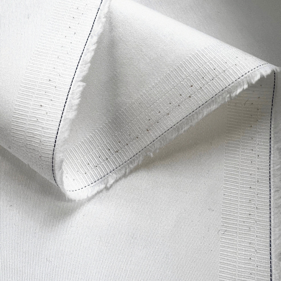 Plain White Cotton Lycra Drill Dress Trousering Fabric Fold