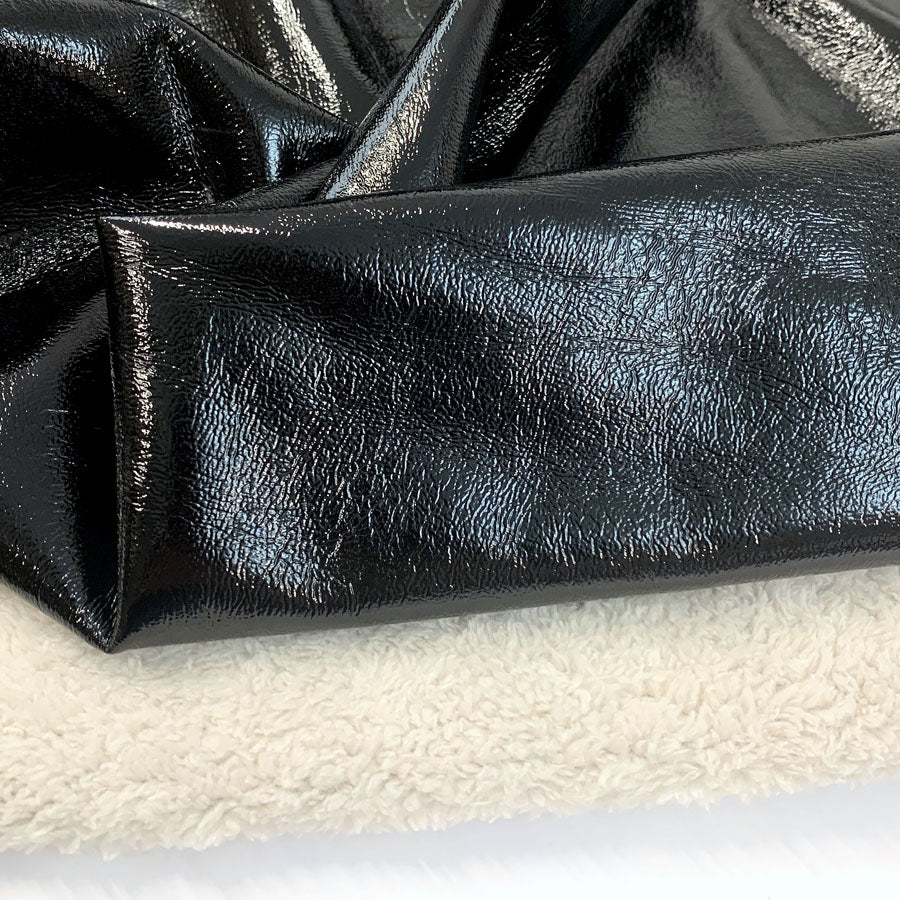 Pleather Teddy Fur Lined Faux Leather Fabric Close Up Fabric Photo