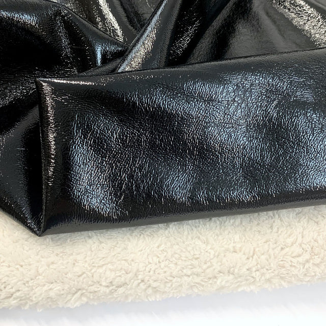 Pleather Teddy Fur Lined Faux Leather Fabric Close Up Fabric Photo