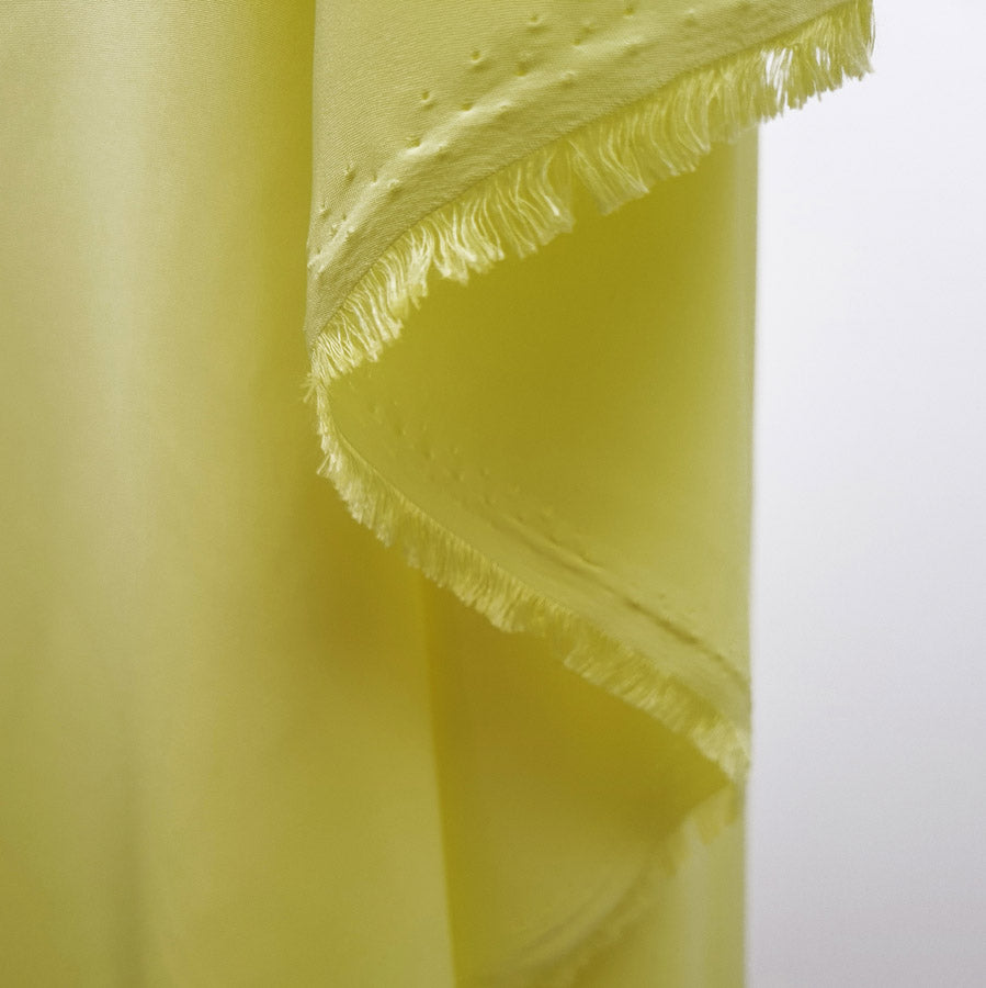 Polyester Dress Fabric Miller Crepe Yellow Hang