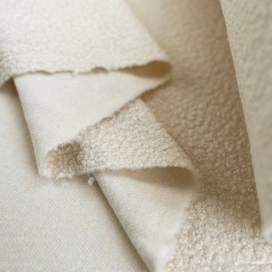 Polyester knitted coating fabric luxury heavy boucle ivory fold