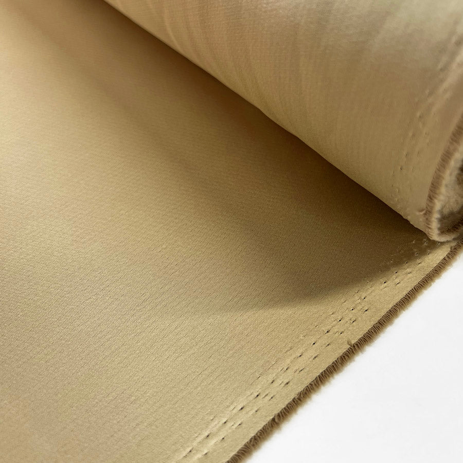 Polyester Satin Back Crepe Dress Fabric Liquid Gold Roll