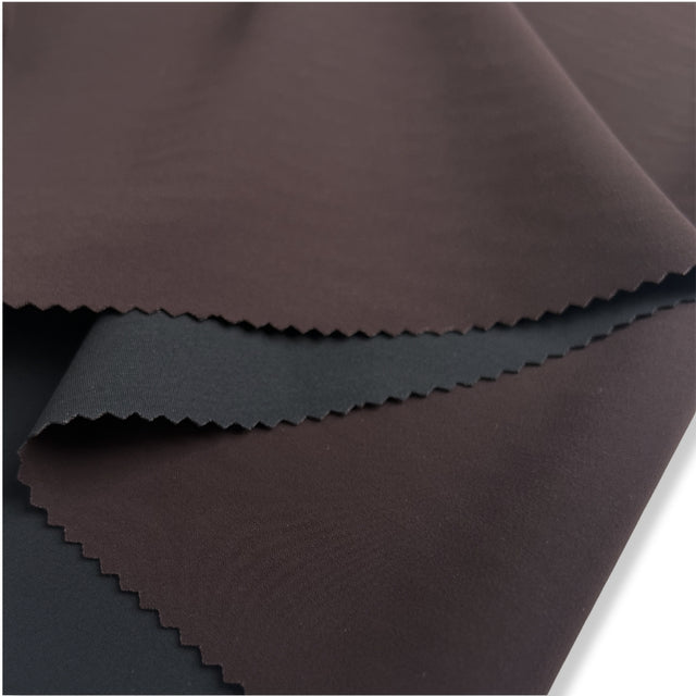Polyester stretch suiting fabric well formed dark damson