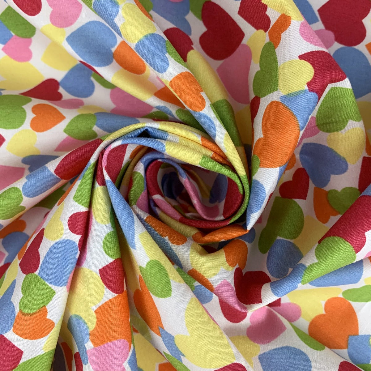 Poplin Print Colourful Hearts Red Multi Coloured Hearts On A White Ground Swirl