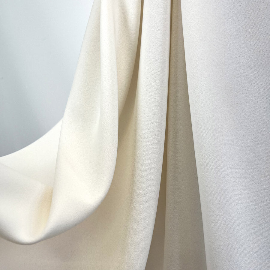 Prestige Ivory Polyester Crepe Dressmaking Fabric Drape