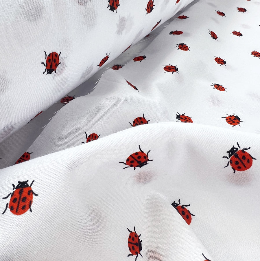 Pretty Polly White Cotton Polyester Print Fabric Ladybirds Close Up