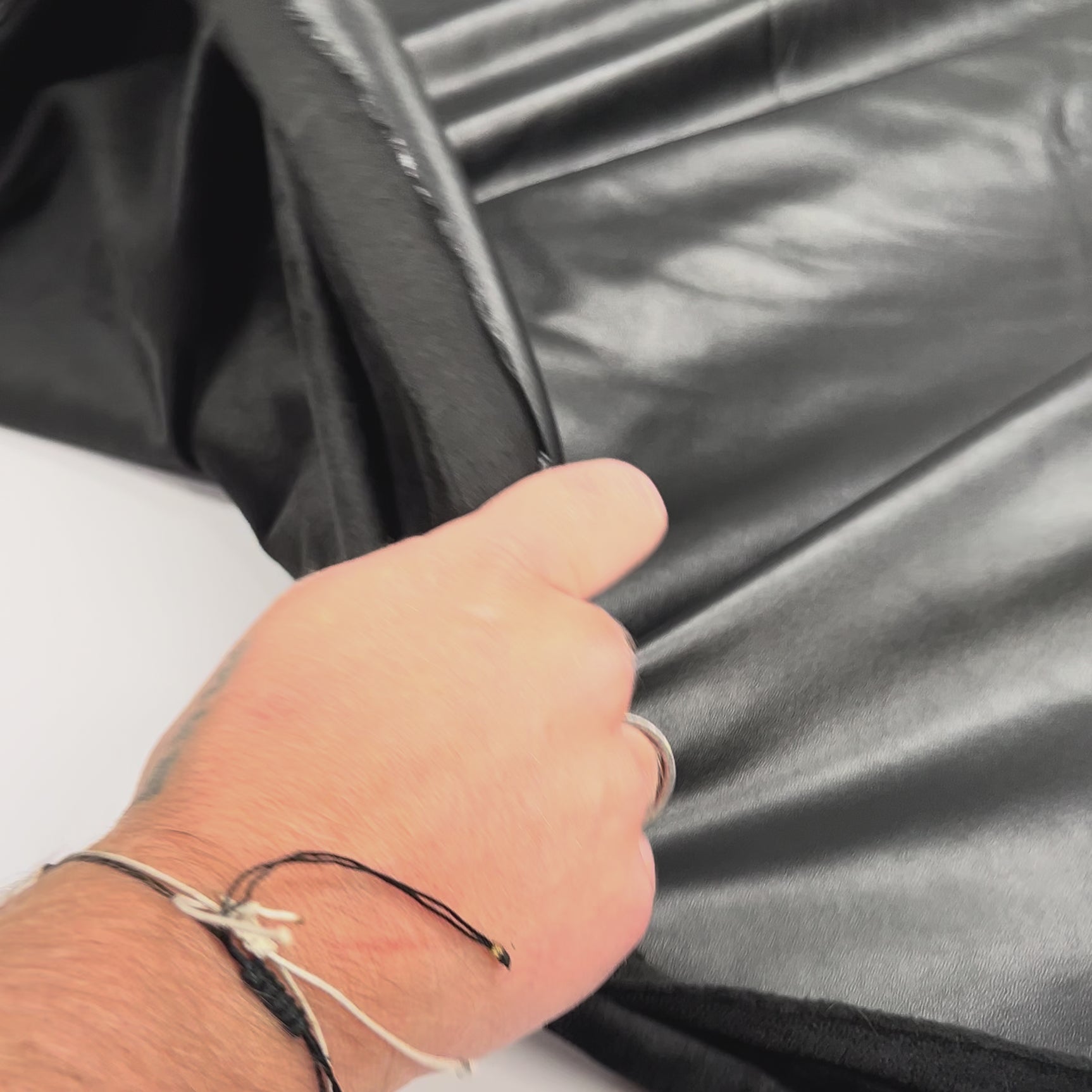 Fur Backed Faux Leather - Black Fabric
Video