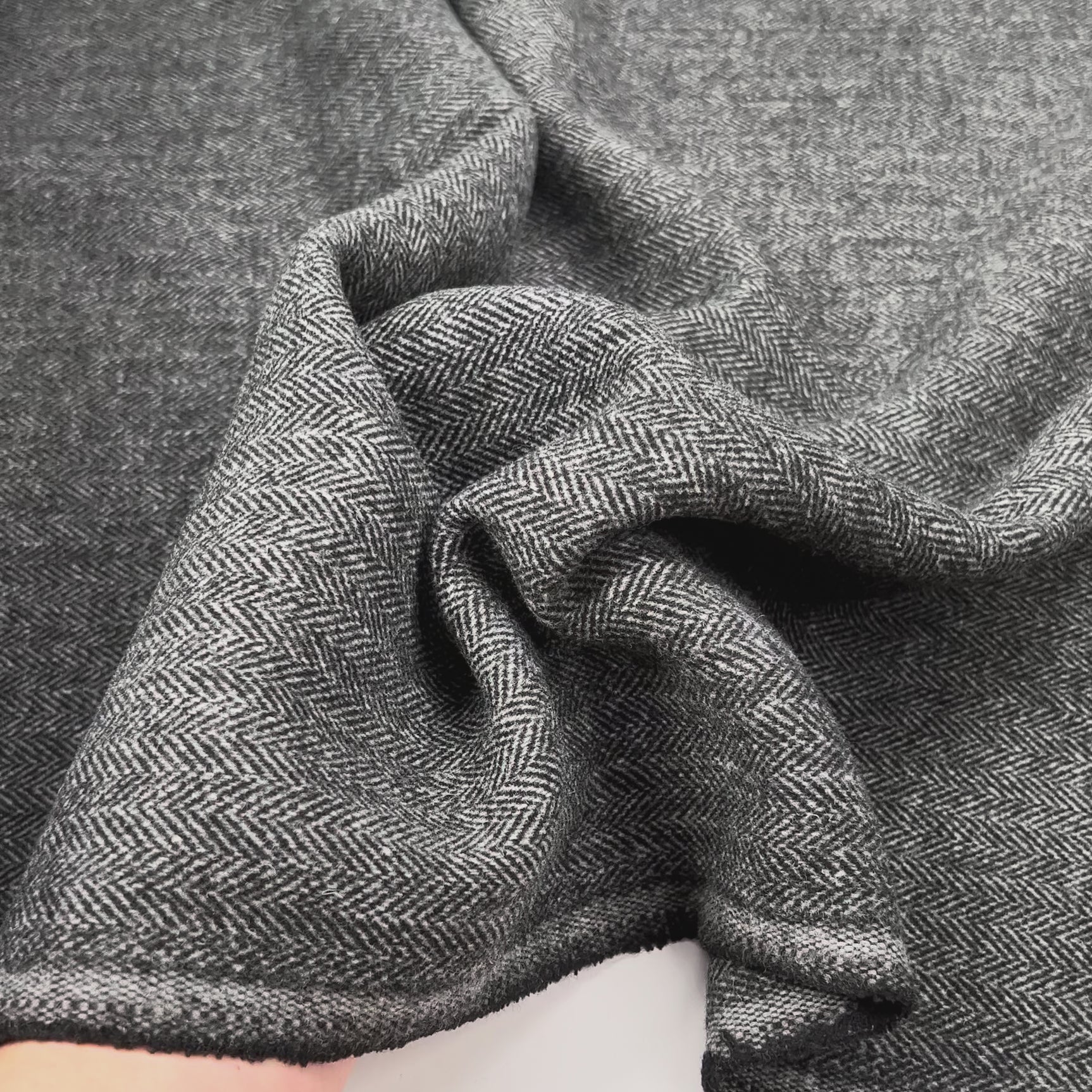 Silent Patient Wool Polyester Mix Black Grey Herringbone Woven Coating Fabric Vid