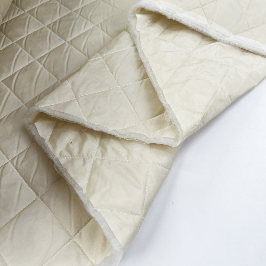 Quilted clotted cream nylon water resistant wadded british coating fabric fold