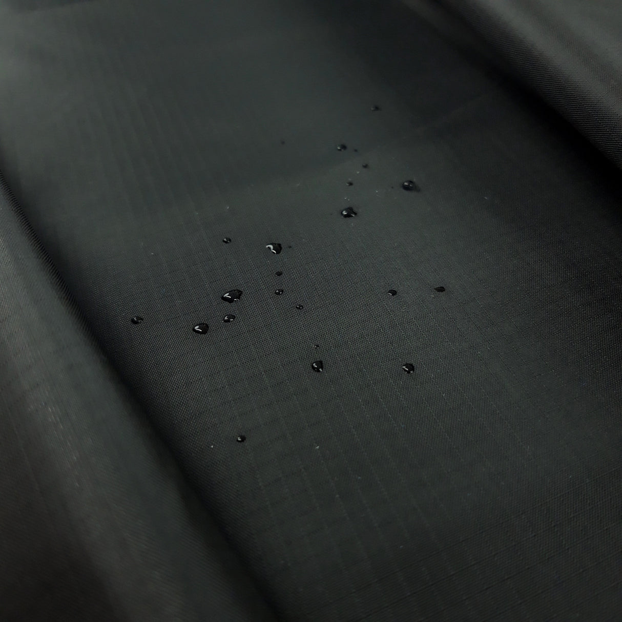 Ripstop Black Nylon Water Resistant Jacketing Fabric Close Up Fabric Photo