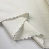Runway polyester viscose elastane ivory twill suiting fabric fold