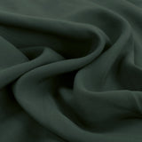 Sandwashed teal polyester viscose blend dressmaking fabric cu