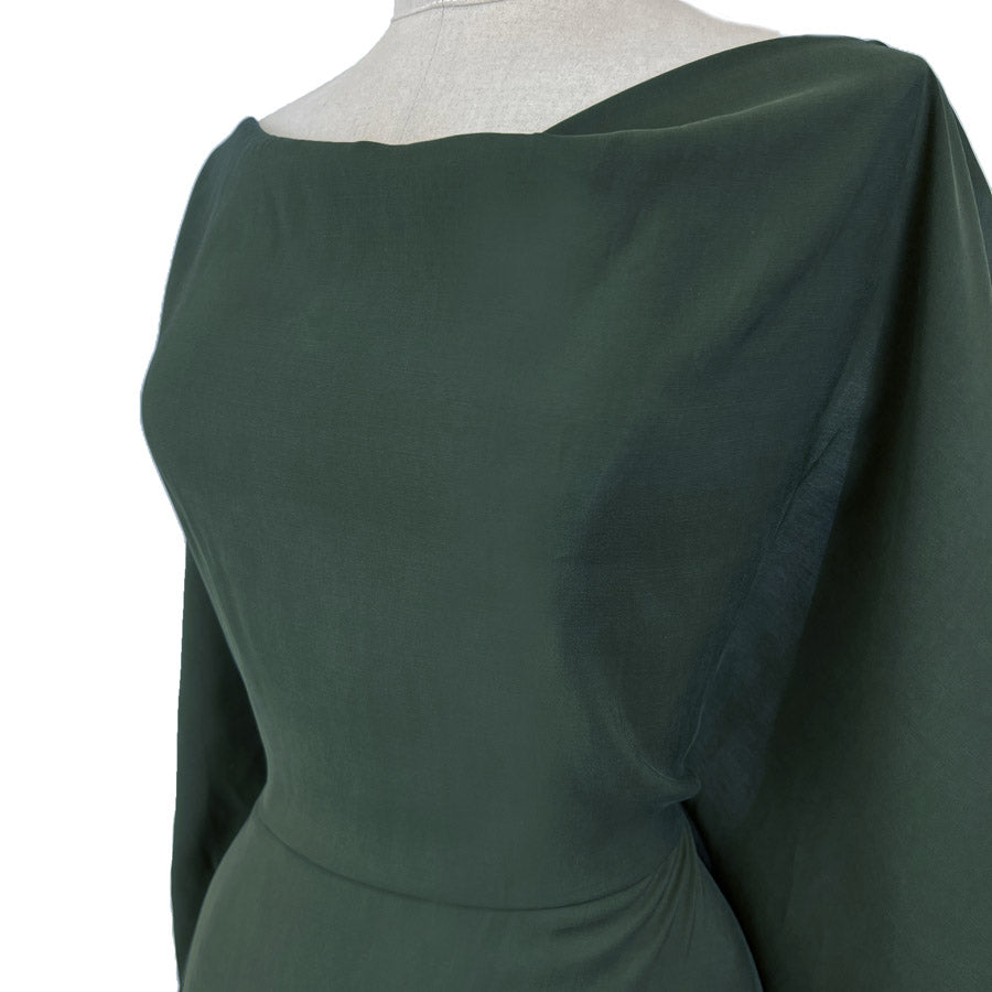Sandwashed teal polyester viscose blend dressmaking fabric side