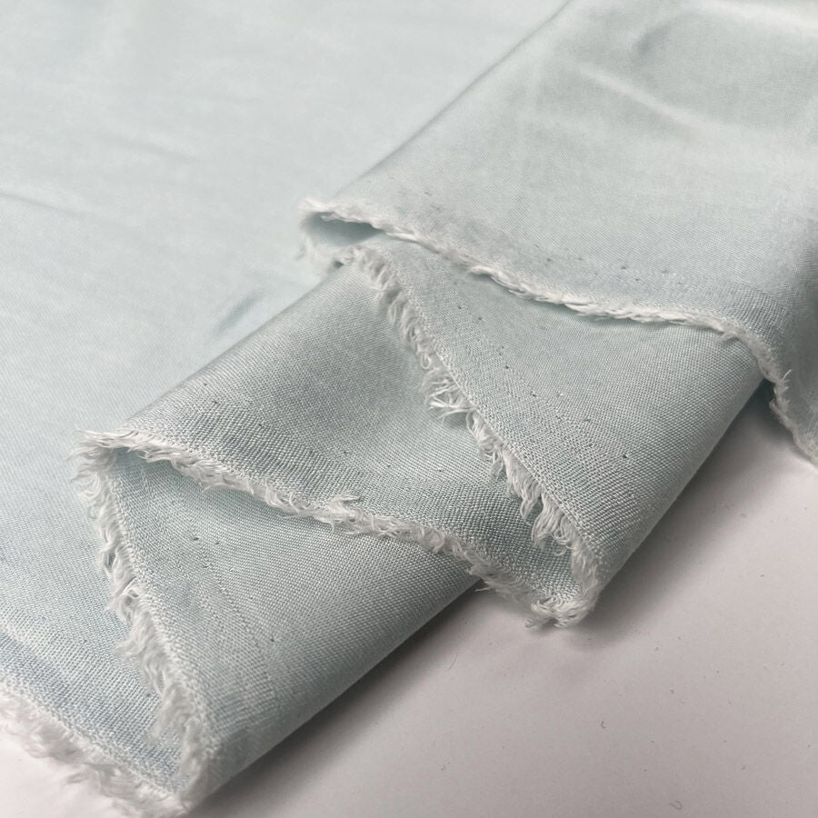 Sereno pale blue tencel italian lightweight shirting fabric fold
