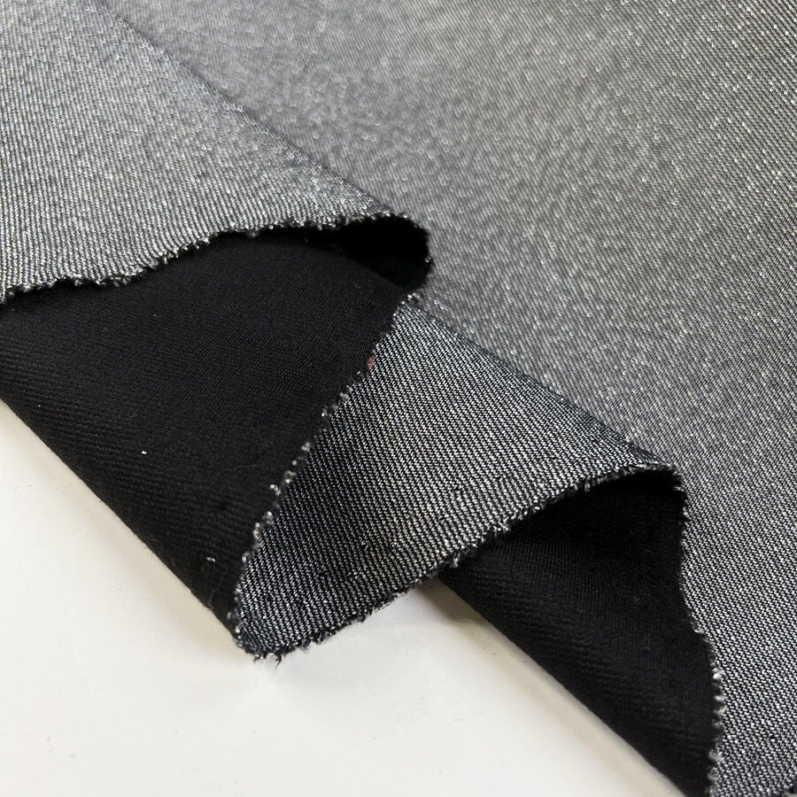 Silver Threads Polyester Elastane Stretch Knit Black Lurex Jersey Fabric Fold