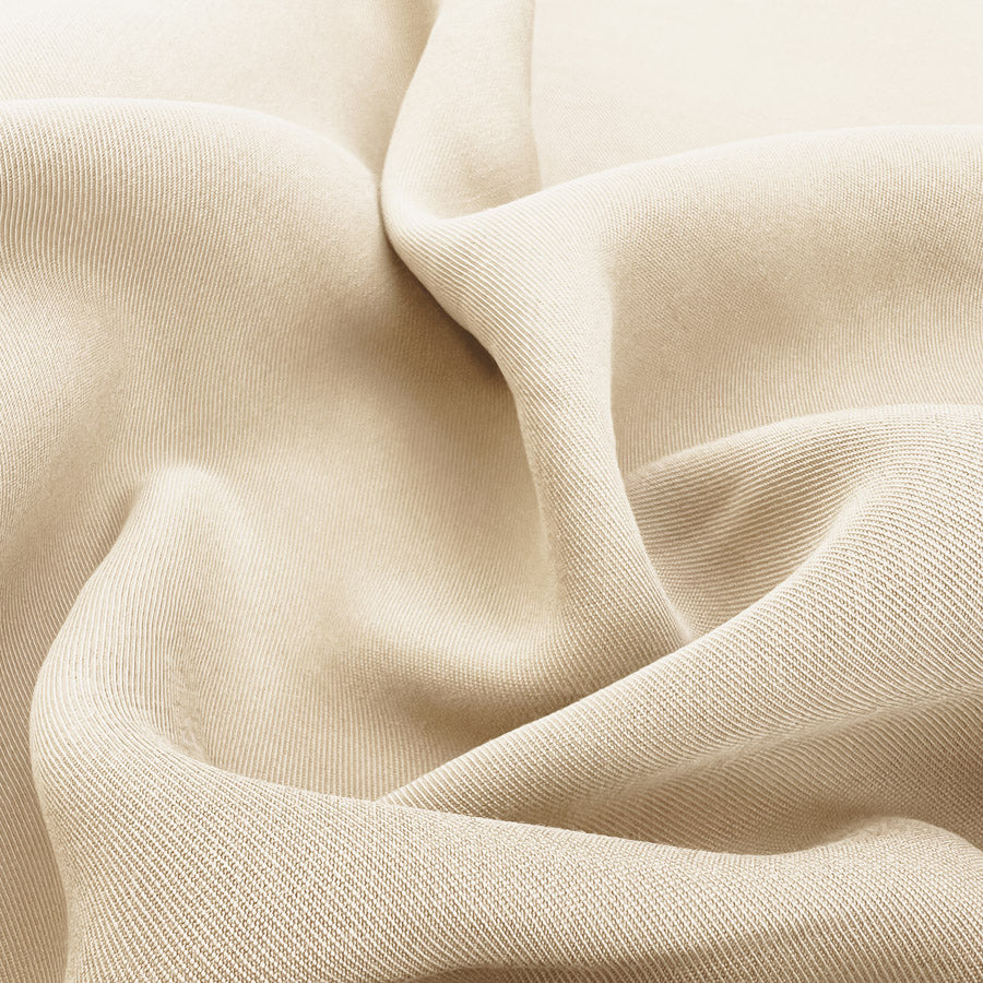 Smooth Rider Ivory Viscose Tencel Finish Dressmaking Fabric