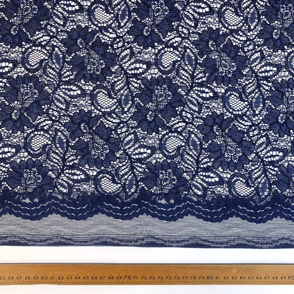 Spanish Eyes Navy Corded Lace Bridal Fabric Scale