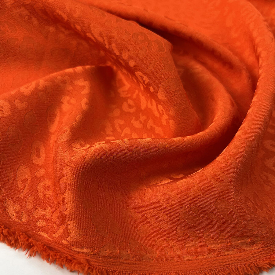 Spanish Sunset Polyester Elastane Orange Leopard Print Dress Fabric