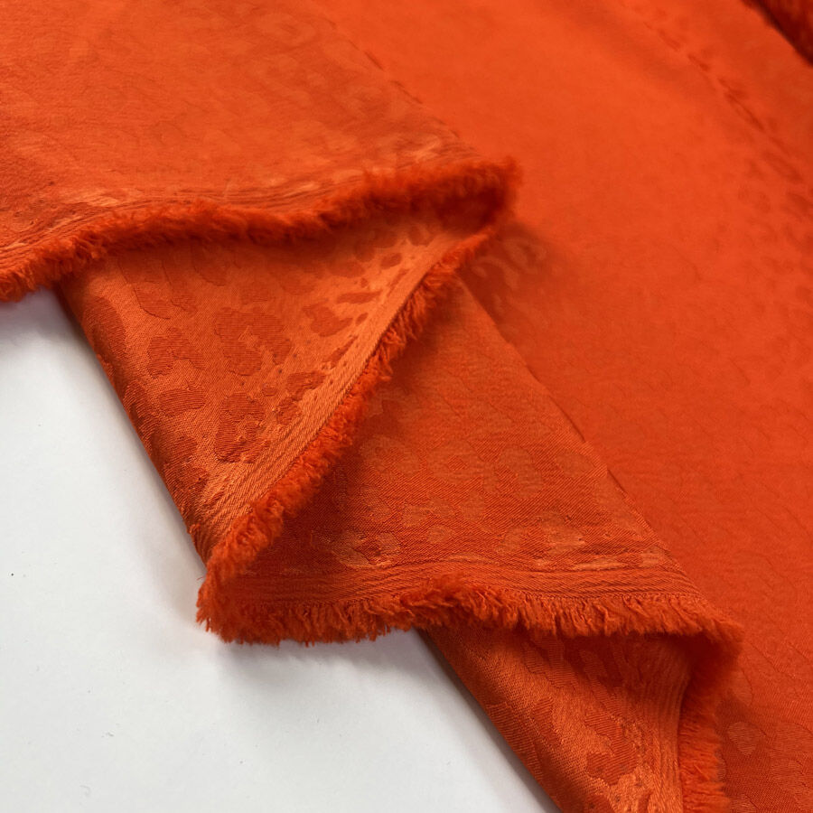 Spanish Sunset Polyester Elastane Orange Leopard Print Dress Fabric Fold