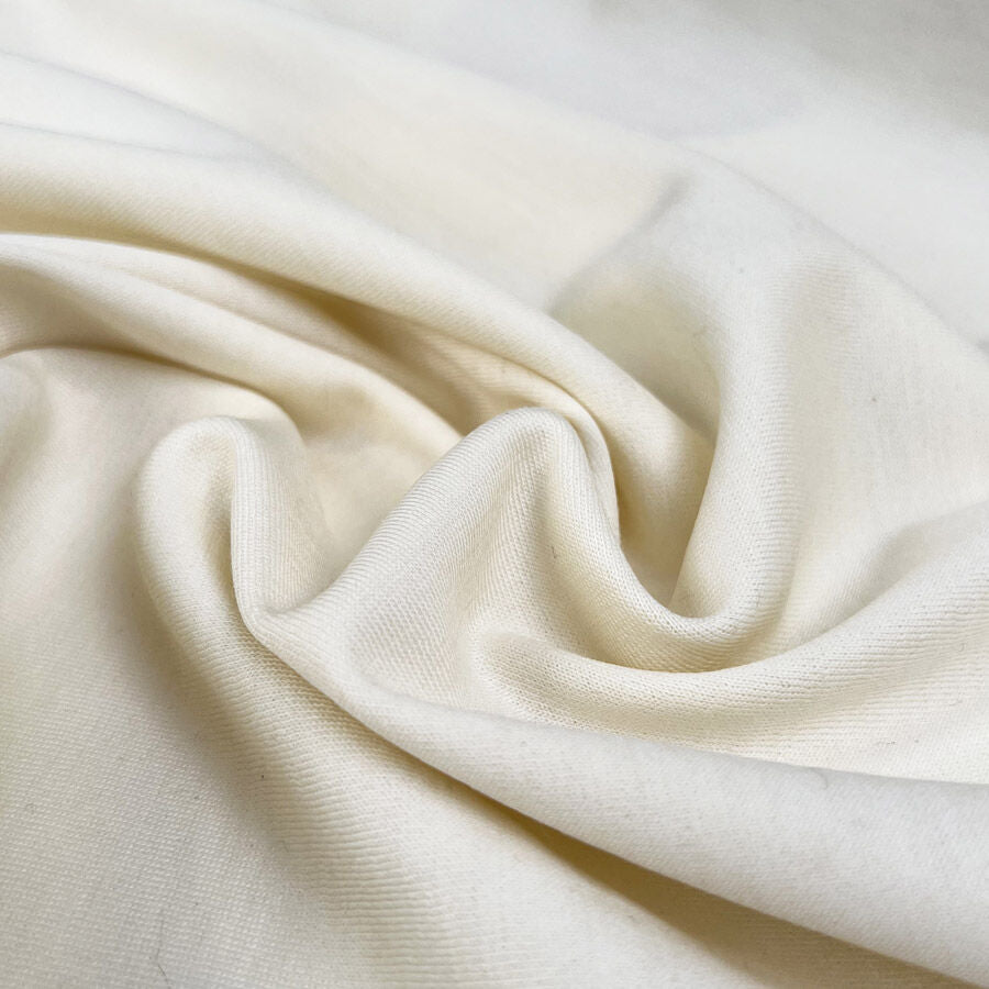 Speciale Cream Wool Stretch Ex Designer Deadstock Knit Jersey Fabric