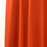 Spongle Orange Knitted Bright Viscose Lycra Jersey Fabric Manequin Close Up Drape Fabric Photo