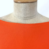 Spongle Orange Knitted Bright Viscose Lycra Jersey Fabric Manequin Close Up Fabric Photo