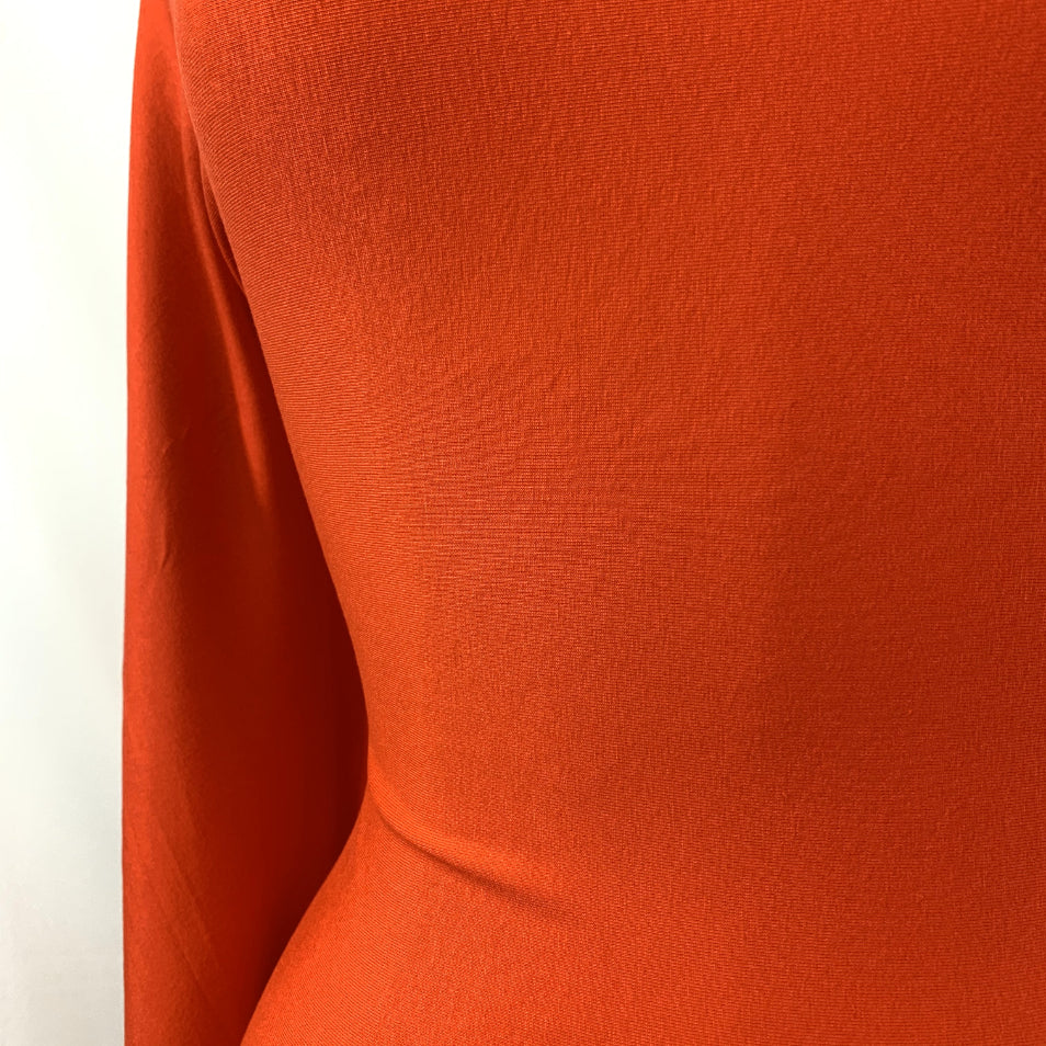 Spongle Orange Knitted Bright Viscose Lycra Jersey Fabric Manequin Dress Fabric Photo