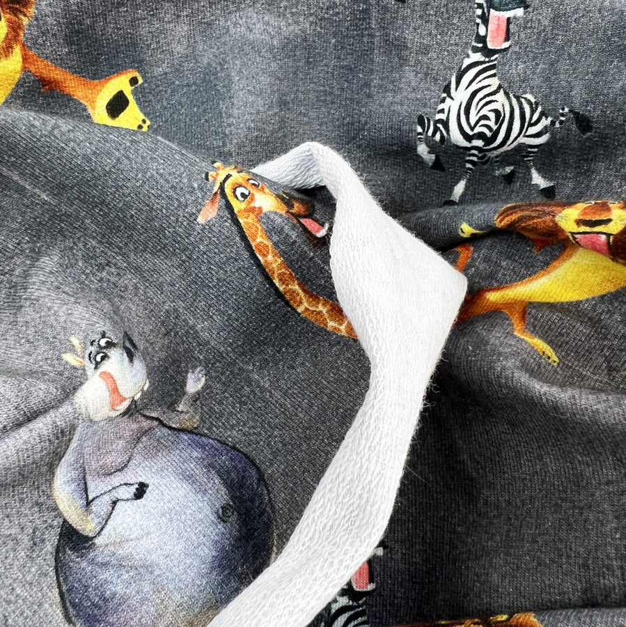 Stonewashed Madagascar Licensed Brushed Cotton Elastane Sweatshirting Fabric Grey