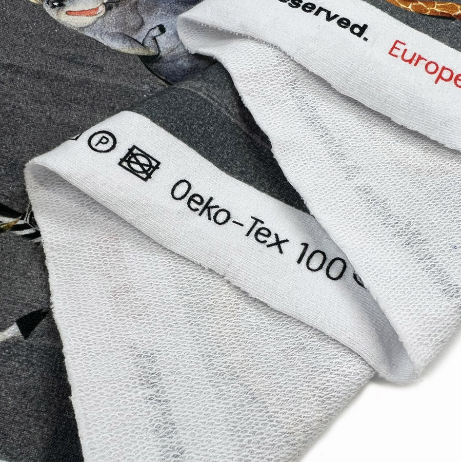 Stonewashed Madagascar Licensed Brushed Cotton Elastane Sweatshirting Fabric Grey Fold