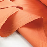 Stretch Cotton Summer Satin Trousering Fabric West Point Orange Fold