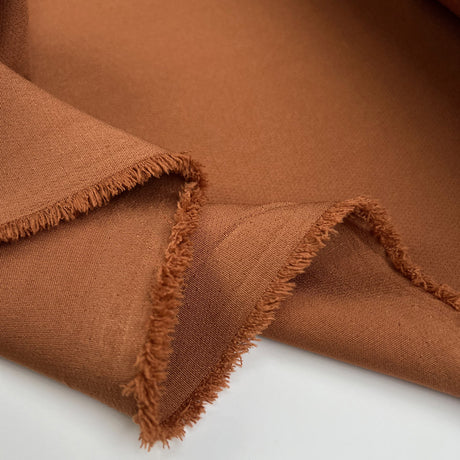 Stretch Crepe Siena Polyester Elastane Woven Rust Brown Plain Suiting Fabric Fold