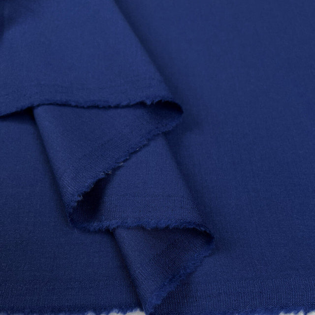 Super Smart Blue Wool Elastane Stretch Suiting Fabric Fold