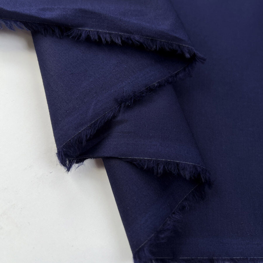 Supersonic Navy Pima Cotton Lawn Plain Woven Shirting Fabric Fold