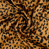 Tanza Gold Black Cheetah Print Polyester Satin Dress Fabric Twist