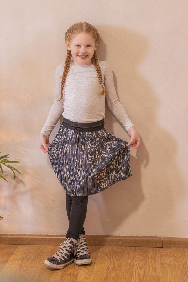 The Other Half Pleated Animal Print Black Beige Dressmaking Fabric Example