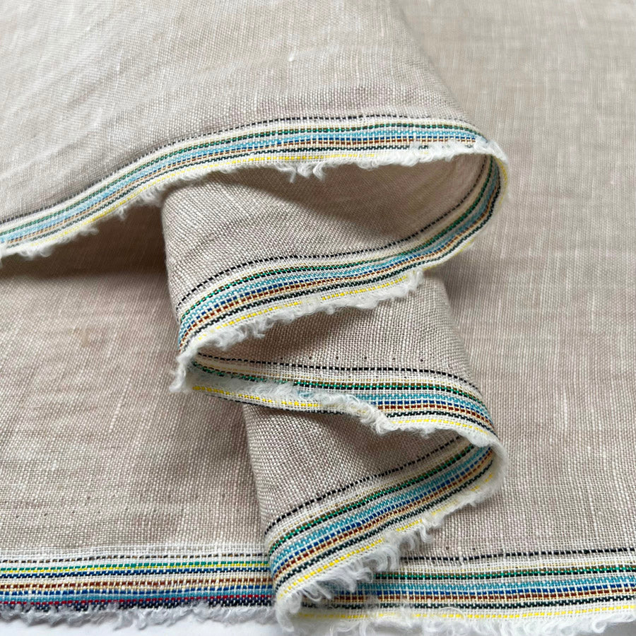 Traditional linen natural stone rami woven dress fabric fold