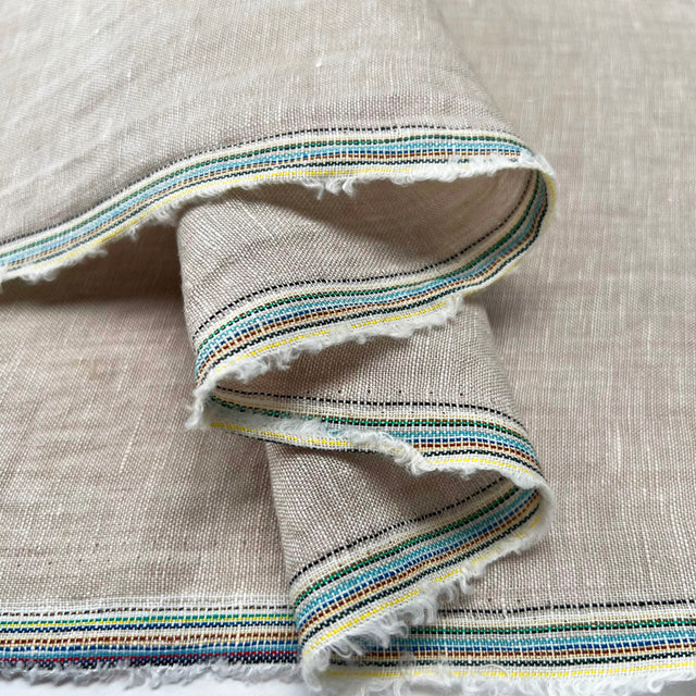 Traditional linen natural stone rami woven dress fabric fold