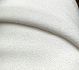 Triple Crepe Ivory Pale Natural Ivory Polyester Triple Heavyweight Crepe Close Up Drape Fabric Photo