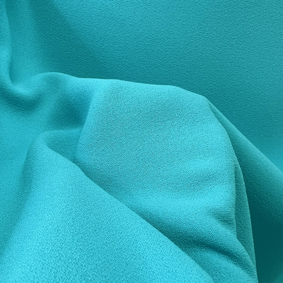 Triple Crepe Turquoise Blue Polyester Dress Fabric
