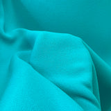 Triple Crepe Turquoise Blue Polyester Dress Fabric