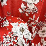 Turn The Night Sky Red Slinky Polyester Elastane Floral Printed Knitted Jersey Fabric Hand