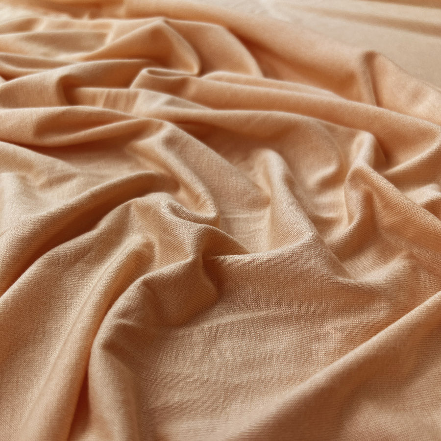 Viscose Jersey Peach Orange Lycra Knitted Dress Fabric