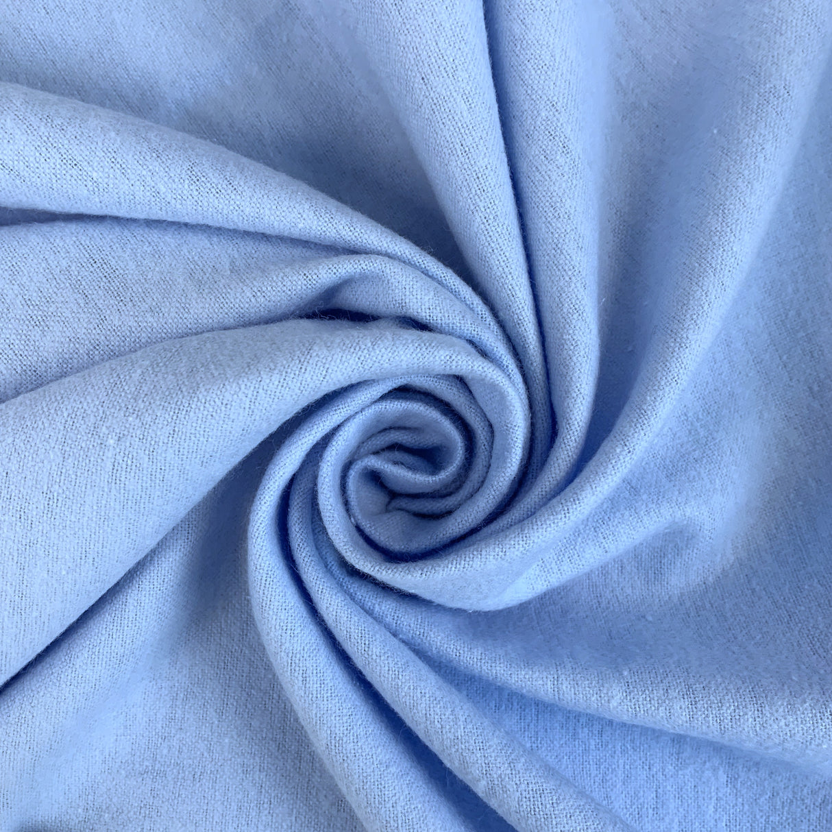 Winceyette Plain Pale Blue Cotton Flannel Fabric Swirl