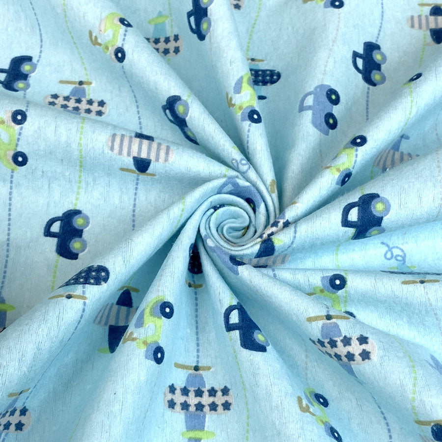 Winceyette The Big Race Cars Pale Blue Brushed Cotton Shirting Fabric Close Up Drape Fabric Photo