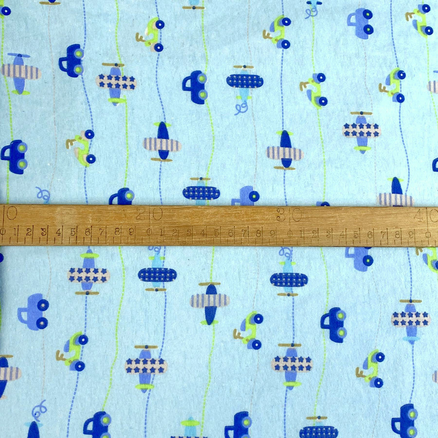 Winceyette The Big Race Cars Pale Blue Brushed Cotton Shirting Fabric Scale Fabric Photo
