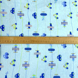 Winceyette The Big Race Cars Pale Blue Brushed Cotton Shirting Fabric Scale Fabric Photo